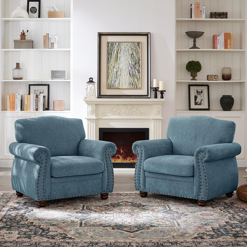 Pair of gray heavy-duty armchairs with rolled arms and nailhead trim, showing dimensions in a product diagram.