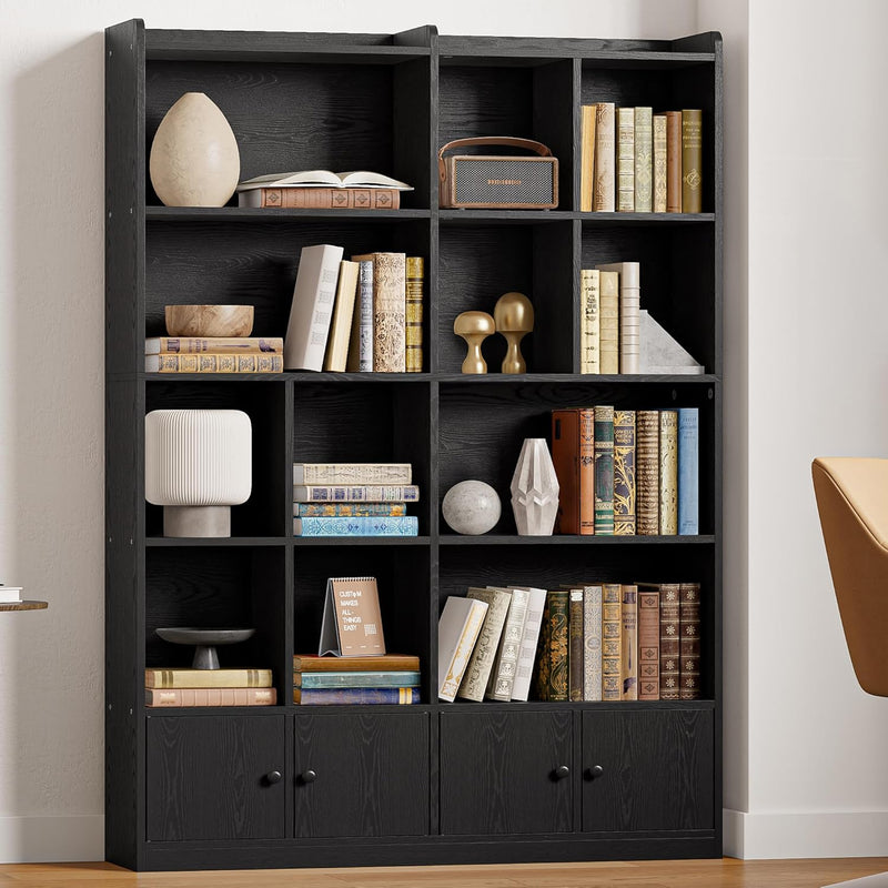 White bookshelf with open cubbies and two bottom doors, open doors revealing stored items.
